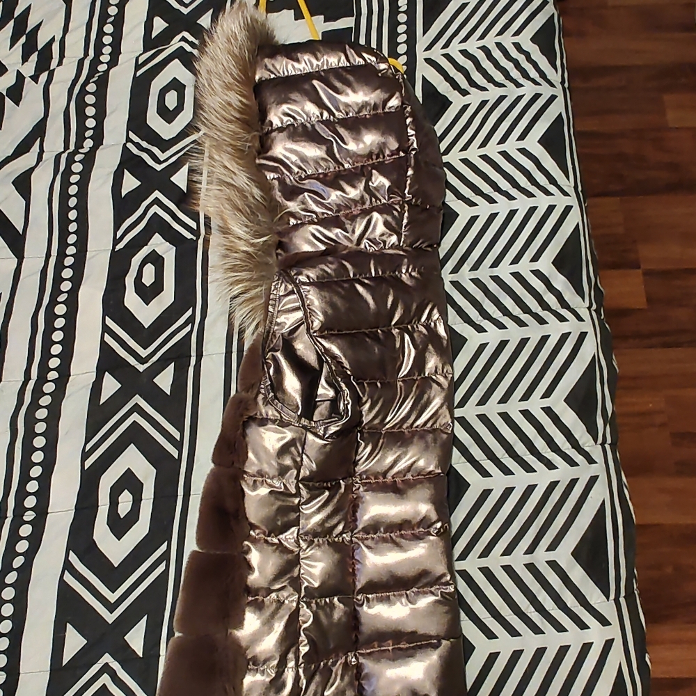 Mitchies copper rabbit and fox trim hooded vest with zip front and side pockets.